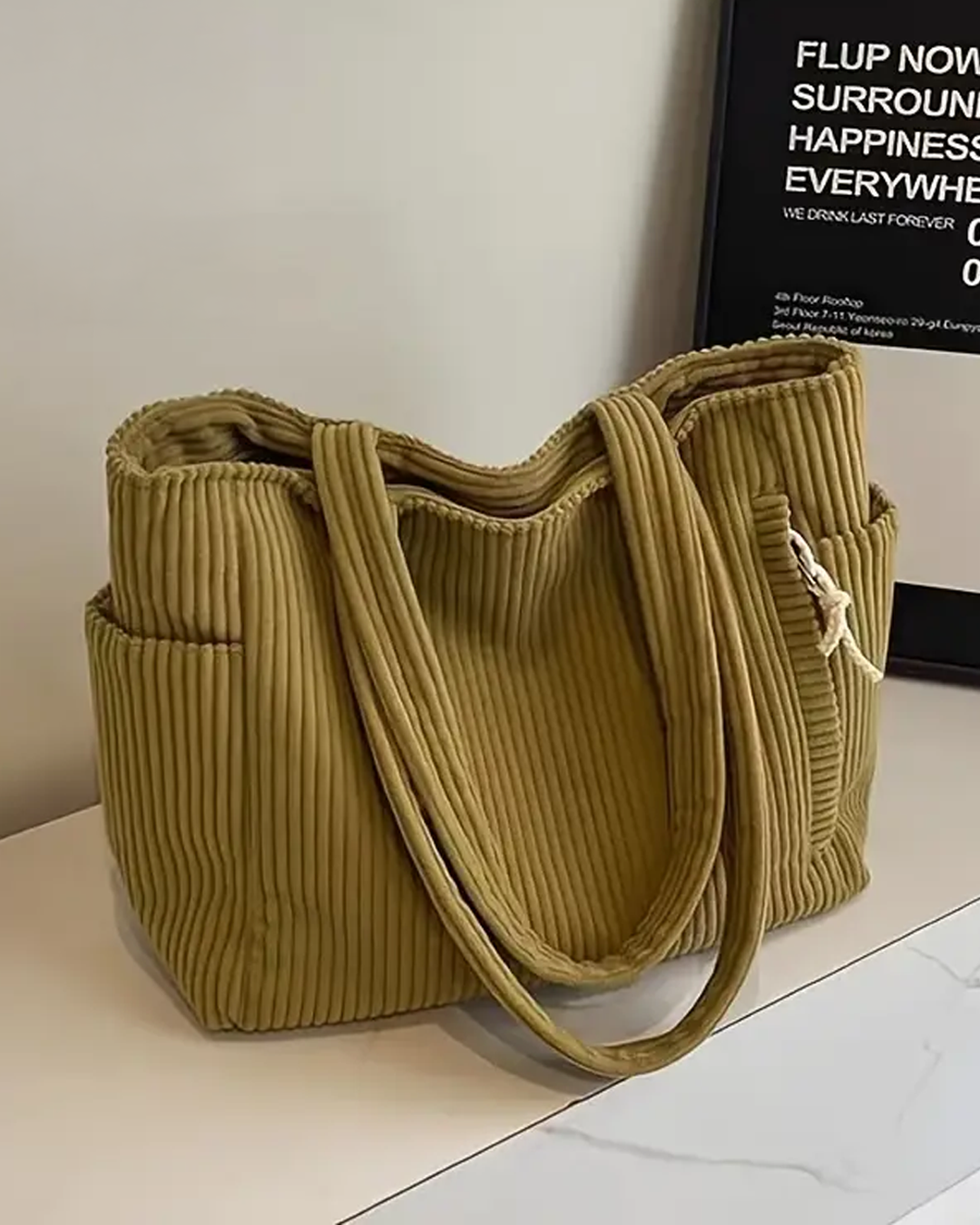 Tilda – Textured Carrying Bag with Cord Detail